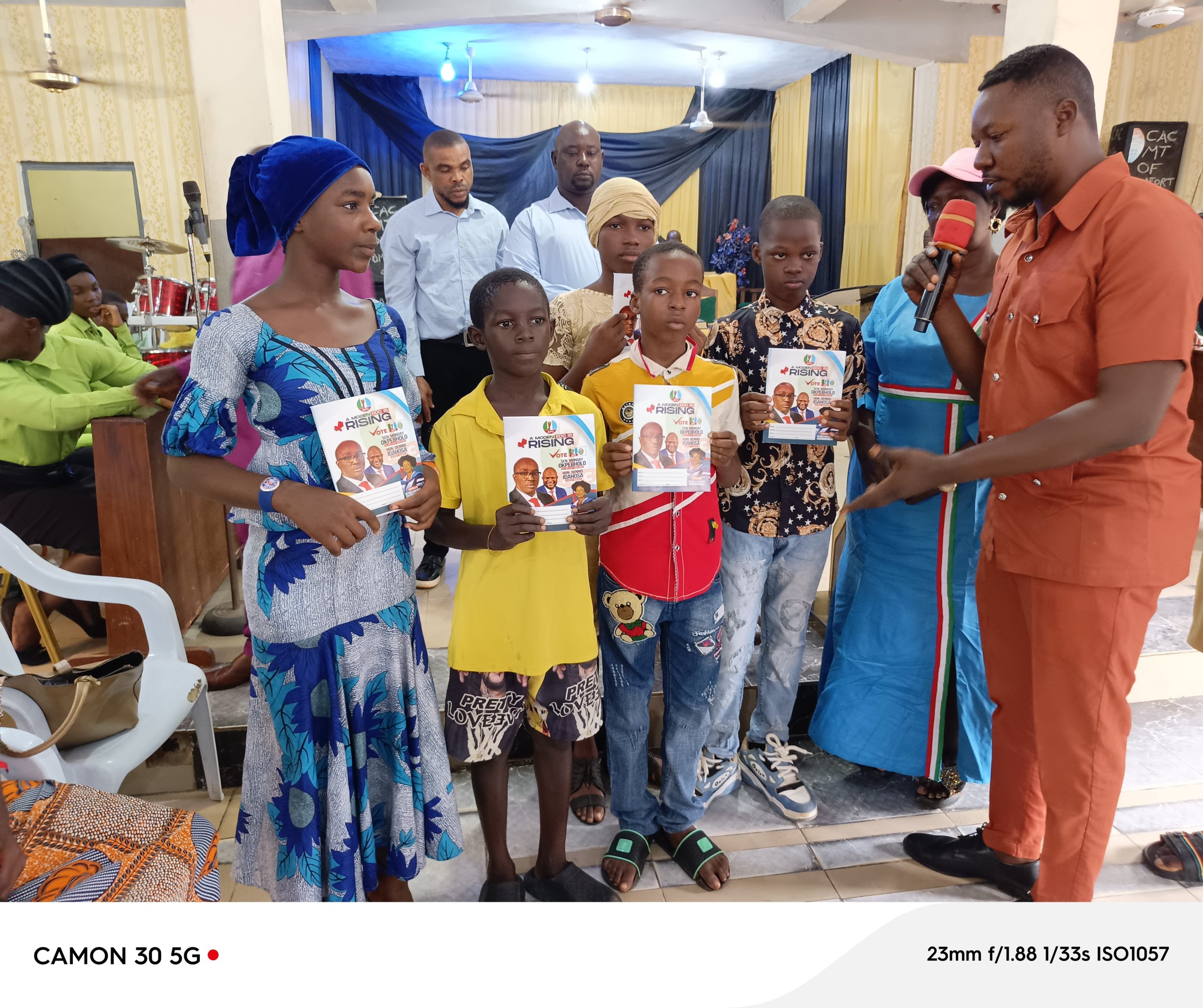 Edo 2024 : Amen Ogbemudia Uhumwangho Supports Okpebholo, Distributes Free Notebooks To Children In Churches.